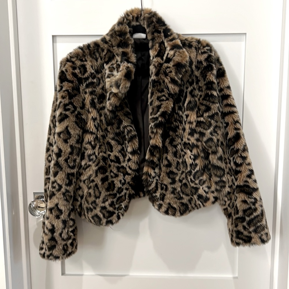 Fuzzy Cheetah print, size medium new without tags unused